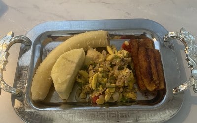 Ackee & salt fish hard food alongside fried plantain