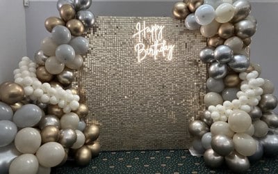 Gold Sequin Wall and Balloon Decor