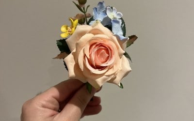 Little details, big impact. Custom buttonholes styled to match your bouquet and wedding vision.