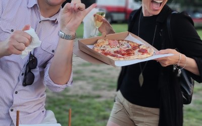 Pizzas served at a festival style party