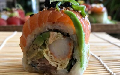 Rainbow sushi roll with lumpfish caviar