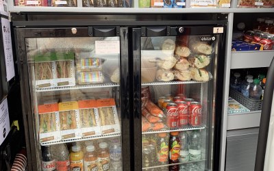 Side of the van with snacks, drinks and sandwiches  