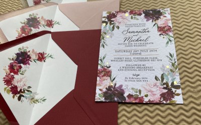 Burgundy and lush pink flowers wedding invitations