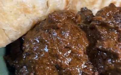 guyanese paratha and braised lamb neck 