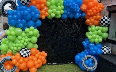 Black sequin wall with balloons 