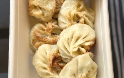 Handmade momo, served steamed, fried or with soybean& peanuts soup. 