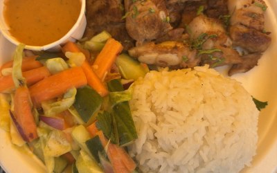 Grilled pork belly, steamed jasmine rice & cucumber salad.