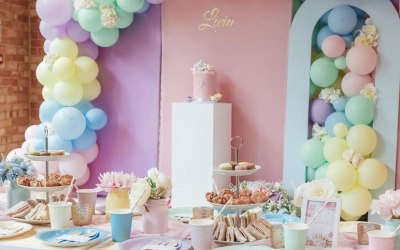 Tea party backdrop and picnic tables 