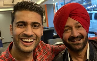 Back with Malkit Singh after providing his DJ backing