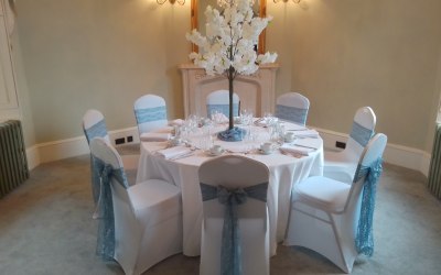 Blossom Tree centrepiece with Blue lace sashes