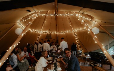 Fairy lights around the interior tipi poles