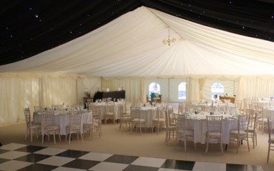 Beautiful night time marquee with checker board dance floor
