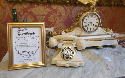 A cream retro audio guestbook phone in place at Melville Castle Hotel.