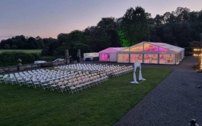 Outdoor ceremony with White folding ceremony chairs
