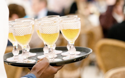 Wedding dessert wine being offered to guests