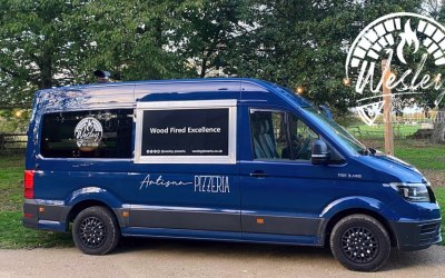Custom converted van with woodfired kitchen