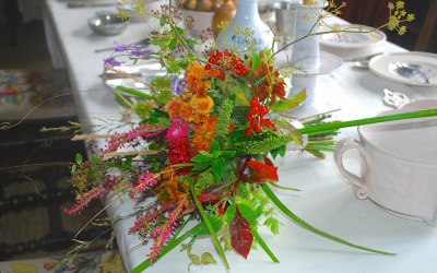 A September wedding bouquet of autumn flowers, berries and grasses