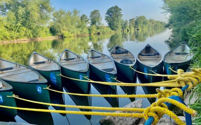 shiny new canoes and equipment