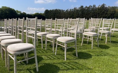 Limewash Chivari Chairs with Cream Pads