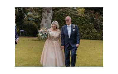 Our bride and groom celebrate their union with a walk down the confetti aisle. 