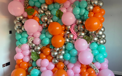 Balloon wall with gypsophila and green leaves - From £320