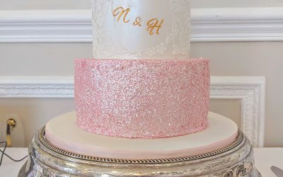 pink sequin cake decorated with flowers
