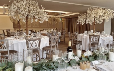 White blossom tree wedding table centre pieces