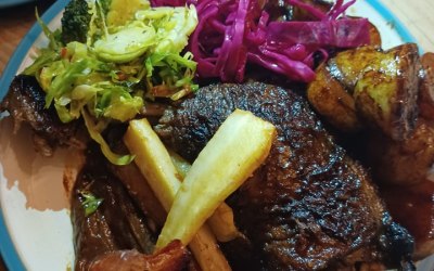 Confit korean potatoes, slow cooked plum soju and orange duck leg, slow roast mulled plum and orange sauce, Miso & maple parsnips and carrots, roast brocolli and sprouts with chilli & garlic and Pickled red cabbage 