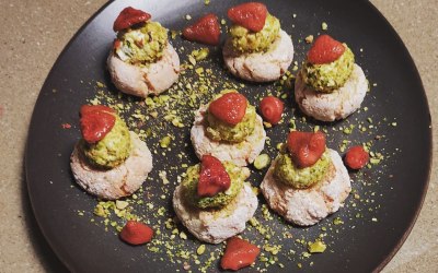 Canapé: pistachio crusted Fromage Frais with pickled Strawberry on amaretto biscuit