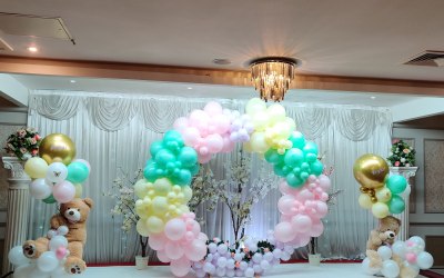 Stage setup with Balloon hoop fullm9on and floating Teddy bear