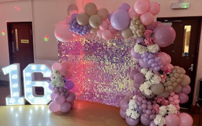 Light up numbers with sequin wall and balloon garland 