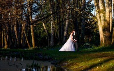 Beautiful Couple and Evening Light In a Wooded Garden
