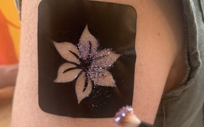 glitter tattoo in process