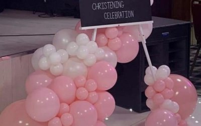 Christening signage and balloons