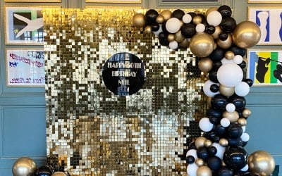 Gold sequin shimmer wall with balloons snd personalised sign 