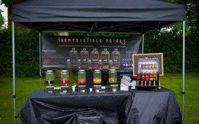 Event set up. Drinks dispensers to give out samples, drinks kept in cooler boxes.