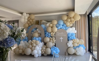 Dreamy christening set up with our sail boards and organic balloon display 