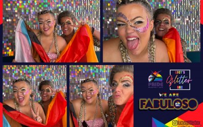Fabulous sisters taking photos at Brighton Pride (horse box photo booth) 