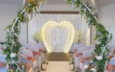 Floral arch and light up love heart arch