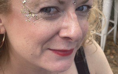 Glitter Face art at festival 