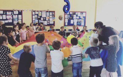 Children loving our parachute game!