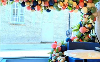 Organic balloon garland for cafe opening in Cambridge