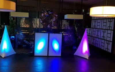 DJ booth and speaker setup with lights