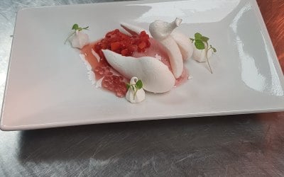Dairy free option to our eaton mess. Meringue swan with home made strawberry sorbet, strawberrys and strawberry pearls