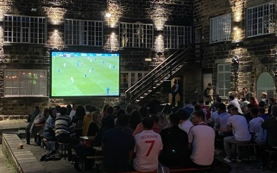 Large football screen at local bar. 