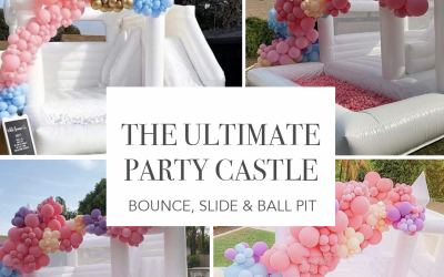 large white bouncy castle with slide and ball pit