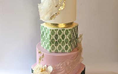Green, pink and gold wedding cake 