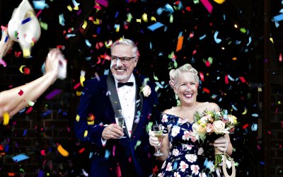Confetti, flowers, bubbles and these two very happy faces!