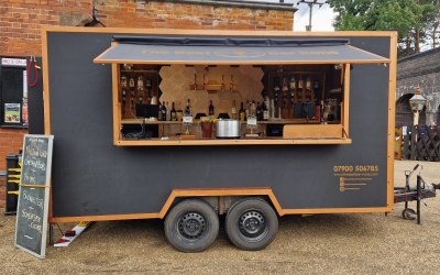 full bar set up with colour changing light wall