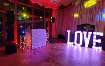 Wedding set up with uplighting & LOVE sign